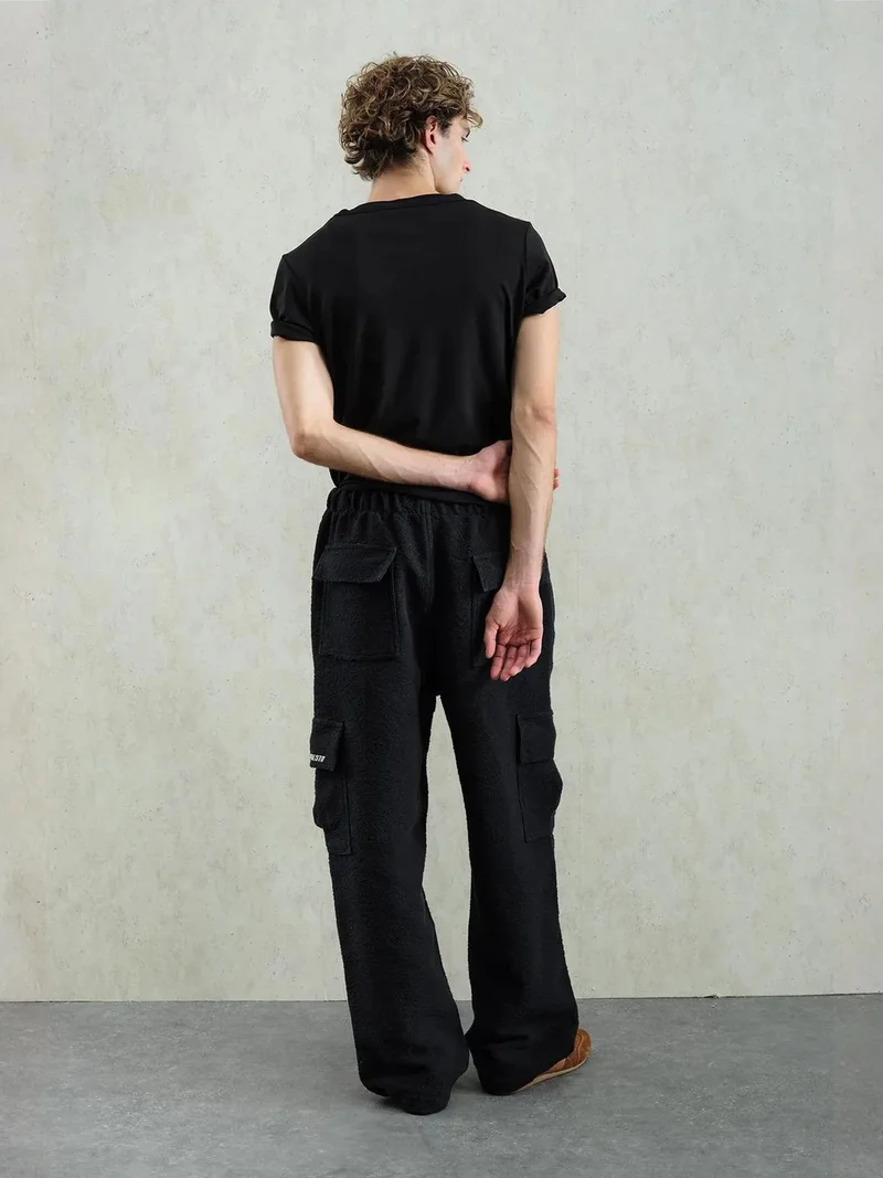 جيستو بنطلون جيستو واسع الساق بنسيج بارز وسهل الارتداء